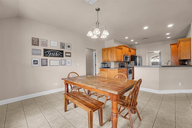 1204 Sheryl Ln, Altus, OK 73521 - dining room with light tile patterned flooring, a chandelier, recessed lighting, baseboards, and vaulted ceiling