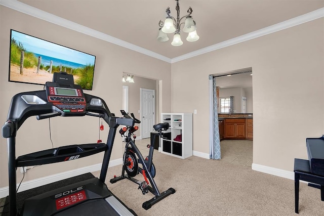 1204 Sheryl Ln, Altus, OK 73521 - exercise room with a chandelier, baseboards, crown molding, and light carpet