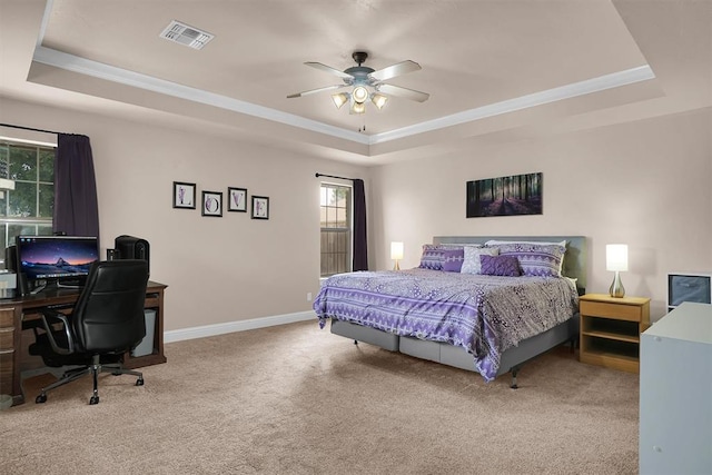 1204 Sheryl Ln, Altus, OK 73521 - bedroom with a tray ceiling, carpet, ornamental molding, an office area, and baseboards