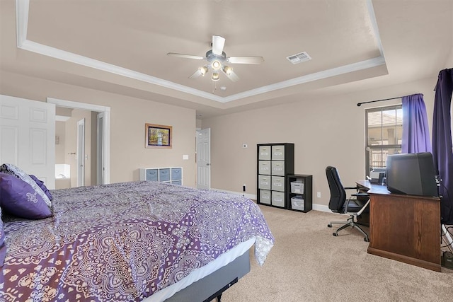 1204 Sheryl Ln, Altus, OK 73521 - bedroom featuring a raised ceiling, carpet floors, an office area, crown molding, and baseboards