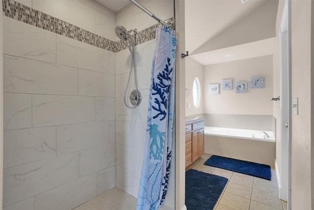 1204 Sheryl Ln, Altus, OK 73521 - bathroom featuring a tile shower, tile patterned flooring, a bath, and vanity