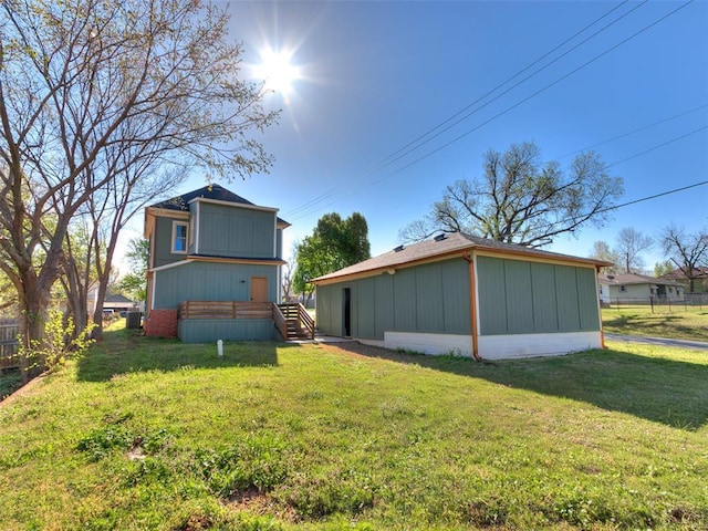 801 N Ash St, Guthrie, OK 73044 - rear view of property featuring stairway