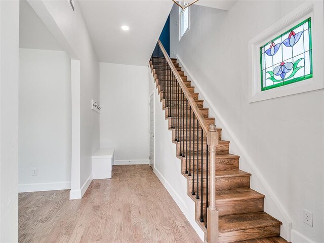 801 N Ash St, Guthrie, OK 73044 - stairway with wood finished floors and baseboards
