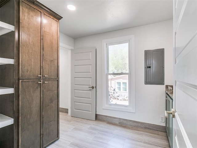 801 N Ash St, Guthrie, OK 73044 - doorway with electric panel, baseboards, and recessed lighting