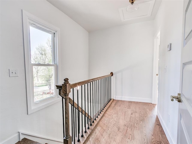 801 N Ash St, Guthrie, OK 73044 - hall featuring an upstairs landing, light wood-style floors, and baseboards