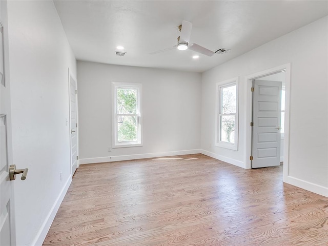 801 N Ash St, Guthrie, OK 73044 - empty room with light wood-style floors, ceiling fan, baseboards, and recessed lighting