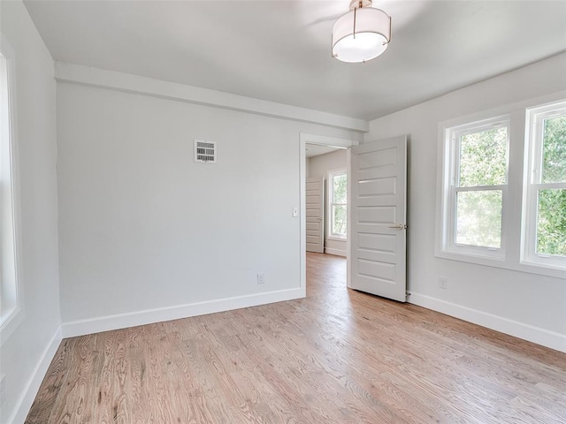 801 N Ash St, Guthrie, OK 73044 - unfurnished room featuring baseboards and wood finished floors