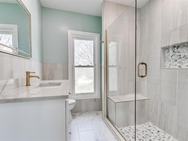 801 N Ash St, Guthrie, OK 73044 - full bath featuring tile walls, toilet, marble finish floors, a shower stall, and vanity