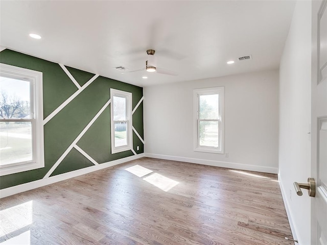 801 N Ash St, Guthrie, OK 73044 - empty room featuring ceiling fan, wood finished floors, baseboards, and recessed lighting