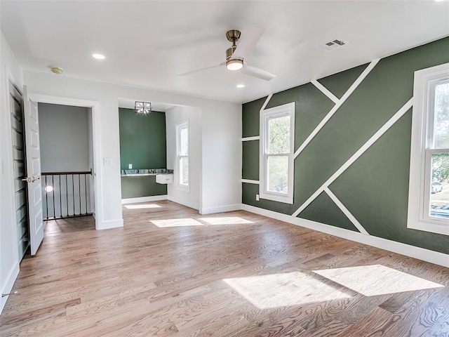 801 N Ash St, Guthrie, OK 73044 - unfurnished room featuring light wood-type flooring, baseboards, ceiling fan, and recessed lighting