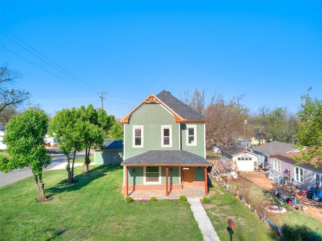 801 N Ash St, Guthrie, OK 73044 - view of front of property featuring covered porch, a front lawn, and a shingled roof