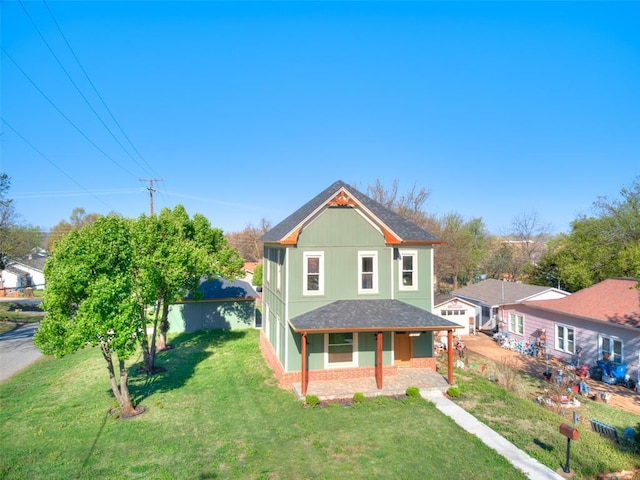 801 N Ash St, Guthrie, OK 73044 - view of front of property with a front lawn and covered porch