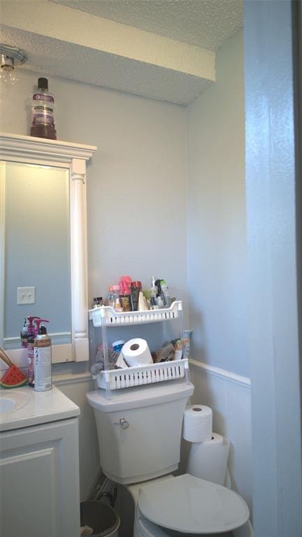 428 NW 91st St, Oklahoma City, OK 73114 - half bath with vanity and a textured ceiling