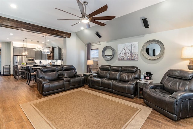 17912 Marron Dr, Edmond, OK 73012 - living room featuring a ceiling fan, lofted ceiling, wood finished floors, and recessed lighting