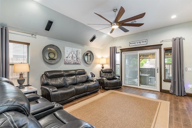 17912 Marron Dr, Edmond, OK 73012 - living area with ceiling fan, vaulted ceiling, dark wood-style floors, and healthy amount of natural light