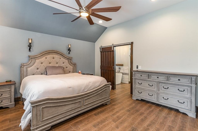 17912 Marron Dr, Edmond, OK 73012 - bedroom featuring lofted ceiling, a barn door, recessed lighting, dark wood-type flooring, and a ceiling fan