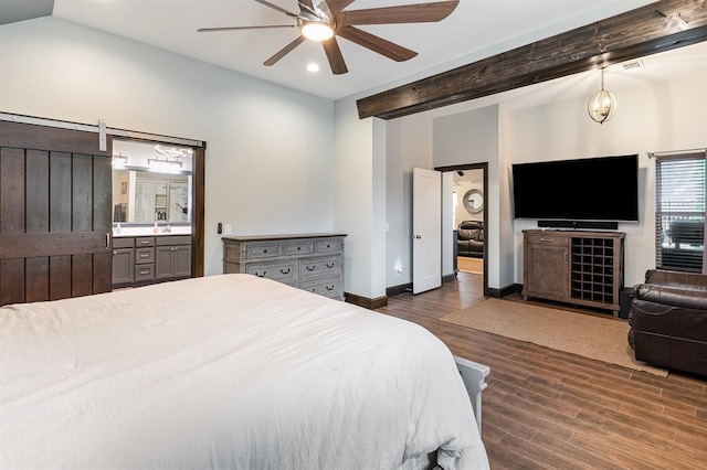 17912 Marron Dr, Edmond, OK 73012 - bedroom with dark wood finished floors, beam ceiling, recessed lighting, baseboards, and a barn door