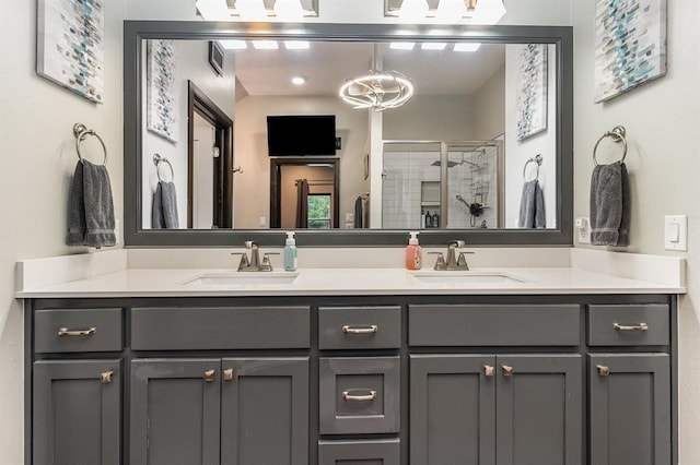 17912 Marron Dr, Edmond, OK 73012 - full bathroom with double vanity and a stall shower