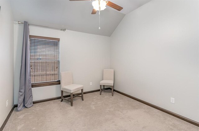 17912 Marron Dr, Edmond, OK 73012 - sitting room with lofted ceiling, light colored carpet, a ceiling fan, and baseboards