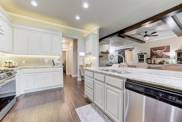 3366 Antler Vly, Guthrie, OK 73044 - kitchen with appliances with stainless steel finishes, open floor plan, a sink, a ceiling fan, and recessed lighting