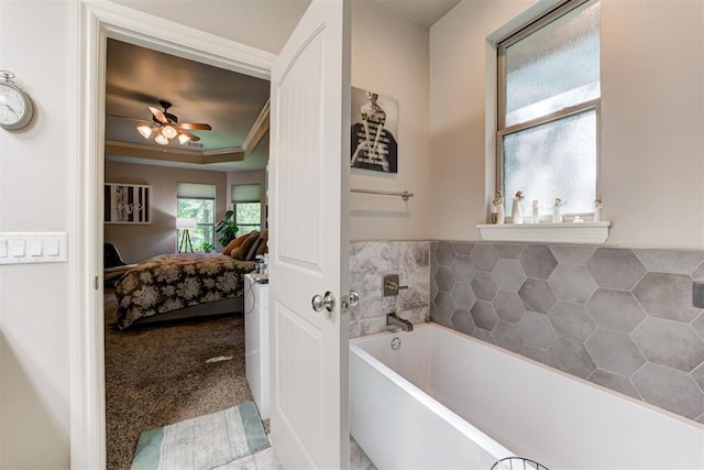 3366 Antler Vly, Guthrie, OK 73044 - bathroom with connected bathroom, a garden tub, a ceiling fan, and ornamental molding