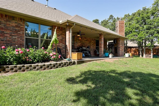 3366 Antler Vly, Guthrie, OK 73044 - view of yard featuring ceiling fan and a patio area