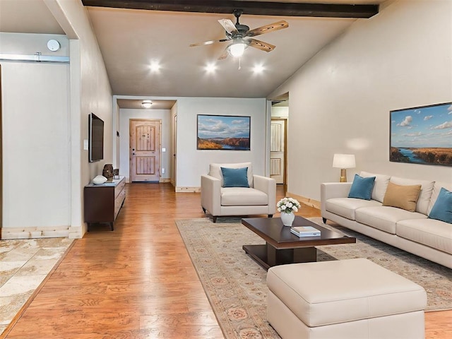 613 S Avery St, Moore, OK 73160 - living room featuring light wood finished floors, a ceiling fan, and baseboards