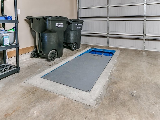 613 S Avery St, Moore, OK 73160 - view of storm shelter with a garage
