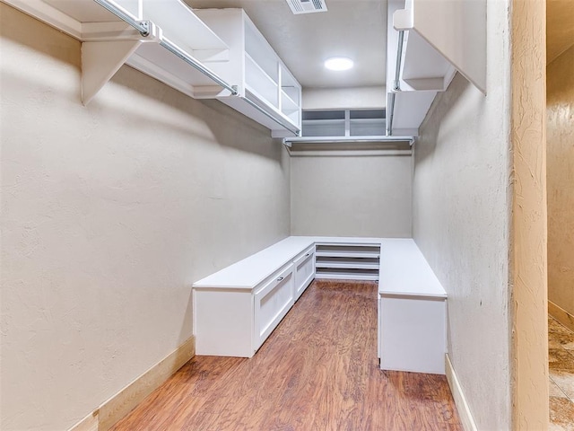 613 S Avery St, Moore, OK 73160 - walk in closet featuring wood finished floors