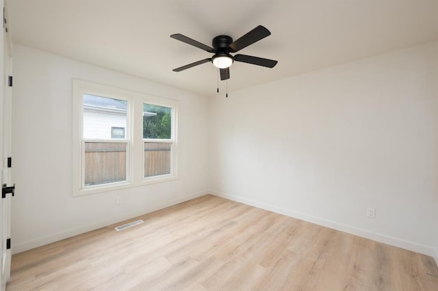 1828 NW 38th St, Oklahoma City, OK 73118 - unfurnished room with light wood-style floors, baseboards, and a ceiling fan