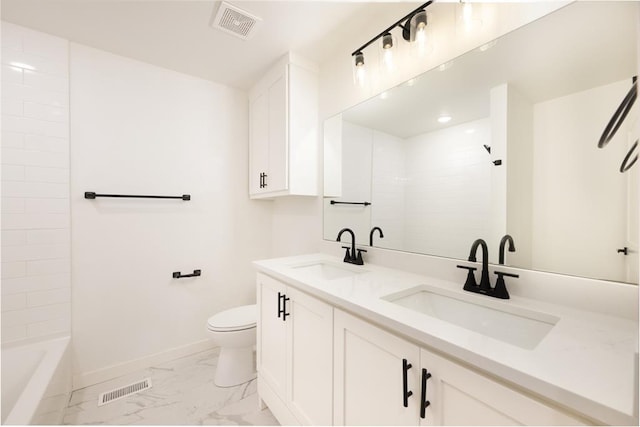 1828 NW 38th St, Oklahoma City, OK 73118 - bathroom with double vanity, marble finish flooring, toilet, baseboards, and shower / tub combination