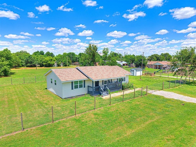 621 W 2nd St, Calumet, OK 73014 - ranch-style house with an outbuilding and a porch