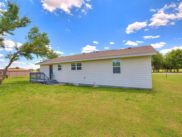 621 W 2nd St, Calumet, OK 73014 - back of property featuring a wooden deck and a yard
