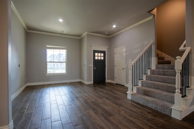 12916 Ponderosa Blvd, Oklahoma City, OK 73142 - entryway with dark wood finished floors, stairs, baseboards, ornamental molding, and recessed lighting