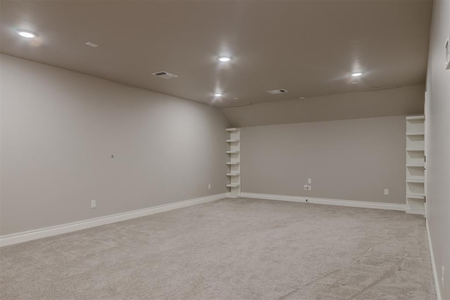 12916 Ponderosa Blvd, Oklahoma City, OK 73142 - empty room with light carpet, recessed lighting, baseboards, and lofted ceiling