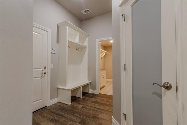 12916 Ponderosa Blvd, Oklahoma City, OK 73142 - mudroom with dark wood-style floors and baseboards