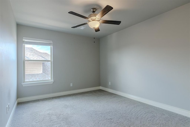 12916 Ponderosa Blvd, Oklahoma City, OK 73142 - empty room featuring carpet floors, baseboards, and a ceiling fan