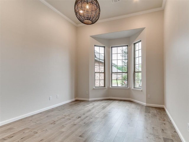 14613 Brantwood Cir, Oklahoma City, OK 73142 - unfurnished room featuring ornamental molding, light wood-type flooring, and baseboards