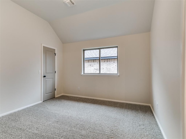 14613 Brantwood Cir, Oklahoma City, OK 73142 - empty room featuring carpet, baseboards, and lofted ceiling