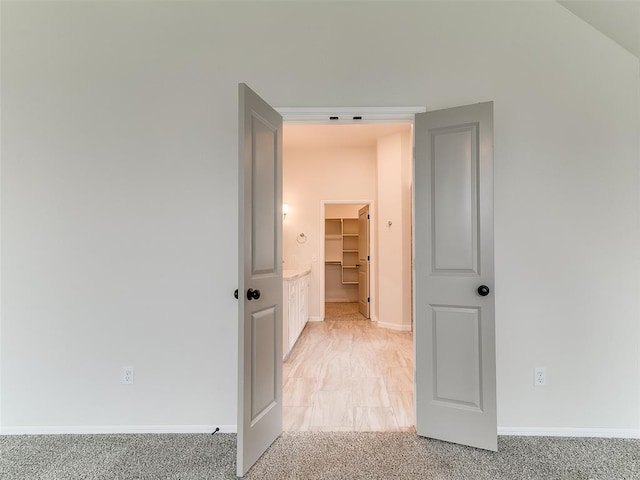 14613 Brantwood Cir, Oklahoma City, OK 73142 - corridor featuring baseboards and light colored carpet