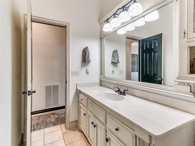 2708 SE 39th St, Moore, OK 73160 - bathroom with vanity and tile patterned floors