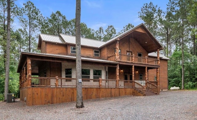 31 Conifer Crossing Trl, Broken Bow, OK 74728 - chalet / cabin featuring a balcony and a metal roof