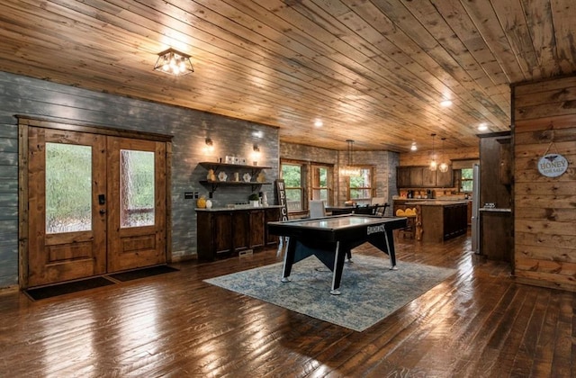 31 Conifer Crossing Trl, Broken Bow, OK 74728 - rec room featuring dark wood-style flooring, wooden ceiling, wooden walls, and french doors