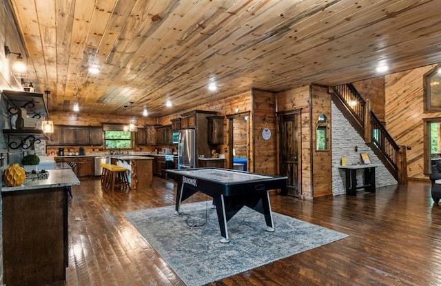 31 Conifer Crossing Trl, Broken Bow, OK 74728 - recreation room featuring wood ceiling, wood walls, and dark wood-style flooring