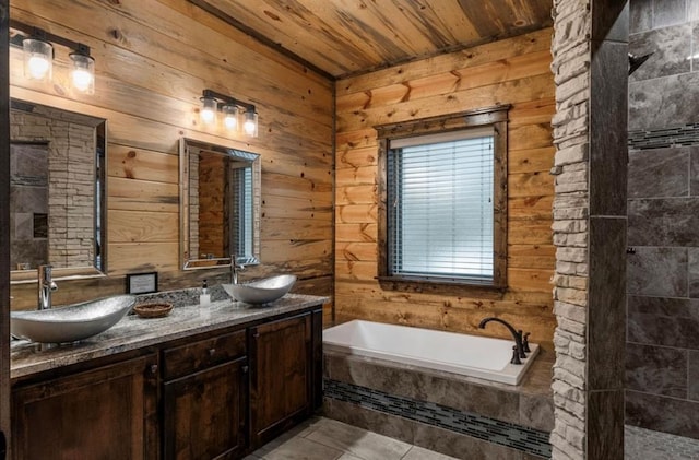 31 Conifer Crossing Trl, Broken Bow, OK 74728 - bathroom with a bath, double vanity, tile patterned floors, wooden walls, and wood ceiling