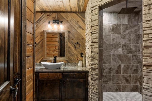 31 Conifer Crossing Trl, Broken Bow, OK 74728 - full bath with vanity, tiled shower, and wood walls