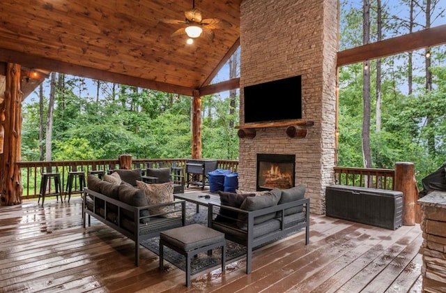 31 Conifer Crossing Trl, Broken Bow, OK 74728 - wooden deck with an outdoor living space with a fireplace