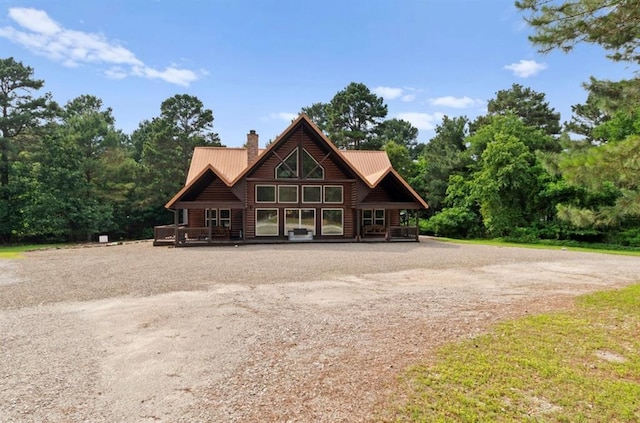 170 Driftcast Rd, Broken Bow, OK 74728 - view of front of home with a chimney and metal roof