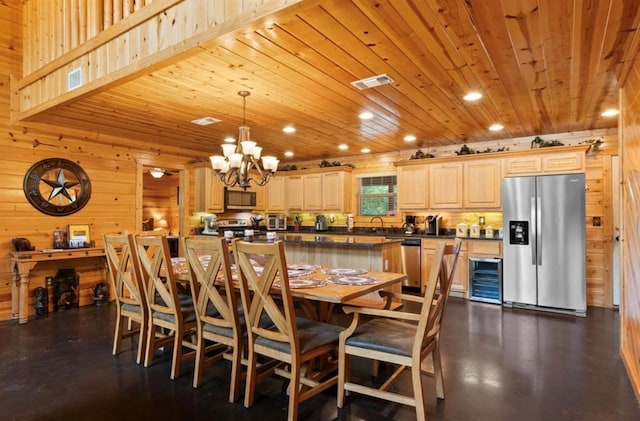 170 Driftcast Rd, Broken Bow, OK 74728 - dining room featuring recessed lighting, wooden walls, wood ceiling, a chandelier, and wine cooler