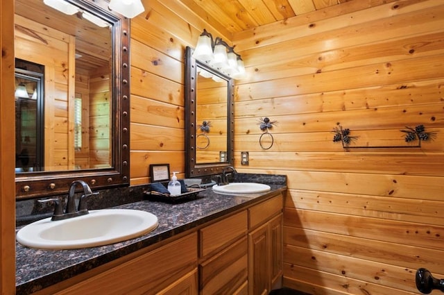 170 Driftcast Rd, Broken Bow, OK 74728 - bathroom featuring double vanity, wooden walls, and wood ceiling